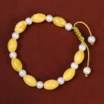 دستبند پودر کهربا با مروارید زنانه کد 26977